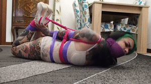 www.lovebondagettes.com - SlimSuicide hogtied with tape and ropes thumbnail